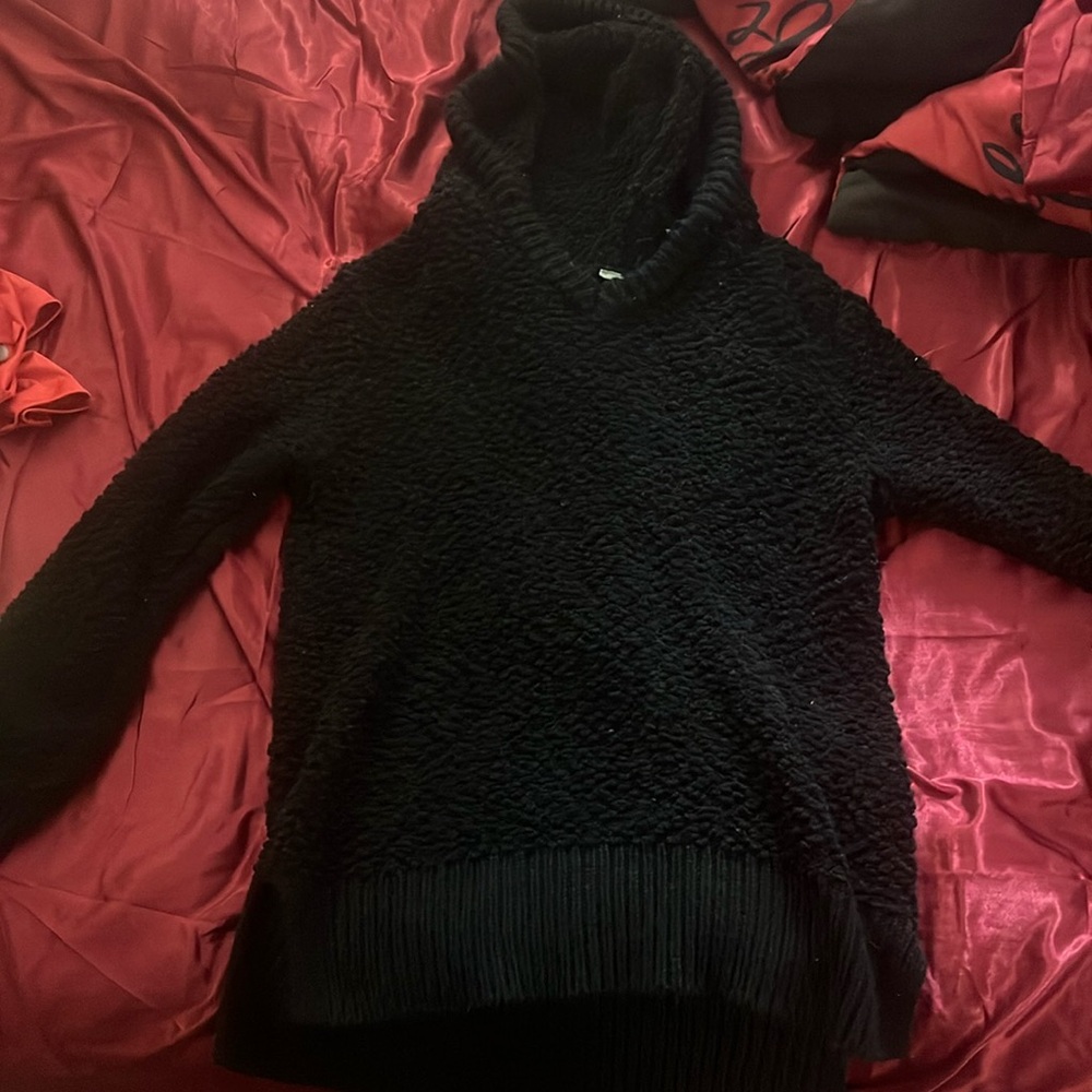 Black sweater with a hood